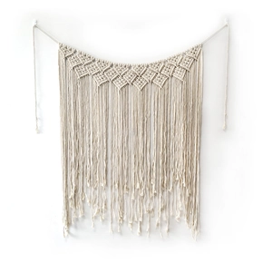 Handmade macrame wall hanging with geometric weaving and off-white cotton fringe tassels