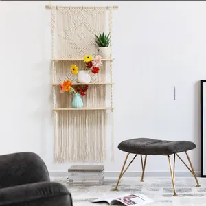 Three-tier boho floating shelf with handcrafted macrame rope and natural wood planks
