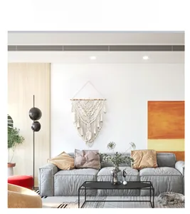 Detailed view of handmade cotton macrame tapestry with tassels for home wall decoration