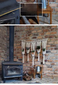 Hand-woven boho wall plant hanger with five pockets on a wooden rod against red brick wall