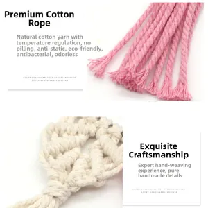 Close-up of handmade woven heart keychain featuring pink tassels and natural cotton cord texture