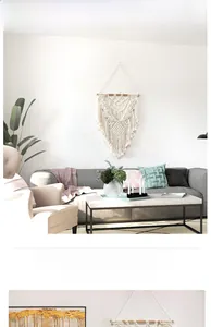 Close-up of bohemian hand-woven macrame wall hanging with fringe details and wood pole