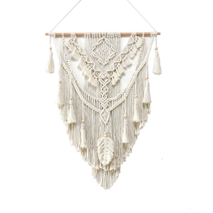 Handmade bohemian cotton rope tapestry with geometric weave and hanging tassels