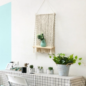 Handmade macrame wall hanging shelf with bohemian cotton rope weave and wooden shelf