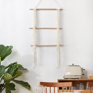 Boho three-tier handwoven macrame wall hanging shelf with wooden bars and cotton fringe