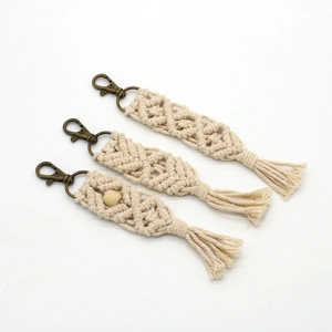 Handmade macrame cotton rope keychains with cream fringe and antique bronze lobster clasp