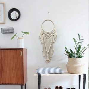 Decorazione da parete boho in corda di cotone tessuta a mano con motivi geometrici e nappe