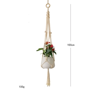 Detail showing a 100cm handmade macrame plant hanger with wooden ring and cotton weave