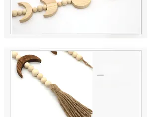 Detail of hand painted wooden moon beads with tassel for Nordic home wall decor