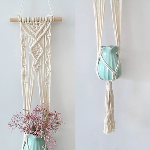 Detail of macrame plant hanger with handwoven cotton rope and decorative tassels