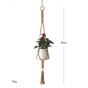 Detail of 95cm hand-woven jute plant hanger with wooden ring and 105g tassels
