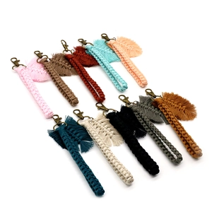 Handmade macrame keychain wristlets with leaf pendants in ten diverse colors