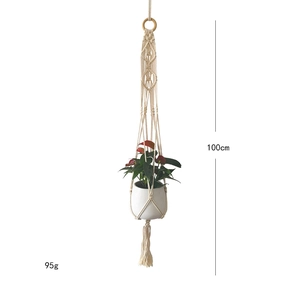 Detail of bohemian cotton rope plant hanger showing 100cm length and wood ring