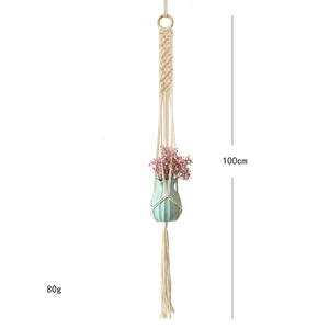 Detail of 100cm macrame plant hanger showing woven cotton rope and wood ring