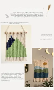 Detail of handmade woven cotton tapestry showing mountain scenery and fringe tassels