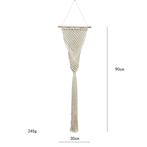 Detail showing handwoven cotton bohemian tapestry with fringes and 90cm height dimension