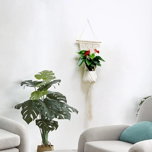 Handmade Macrame cotton rope hanging planter with wooden pole for modern wall decor