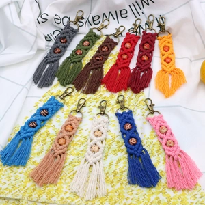Detailed view of handmade macrame keychains with ethnic beads and cotton fringe tassels