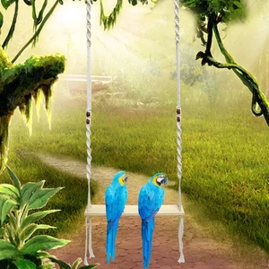 Detail of wooden pet bird swing with hand-woven cotton ropes and dark brown beads for parrots