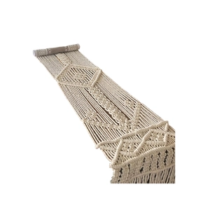 Handmade boho macrame table runner with cotton rope geometric patterns and fringe