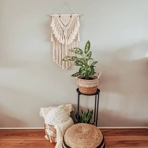Handmade bohemian woven tapestry wall hanging with macrame fringe and wooden rod