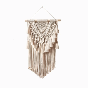 Handmade Macrame Wall Hanging with geometric patterns and fringe for bohemian home decor