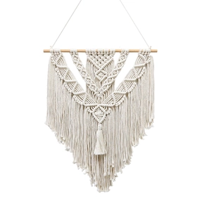Handmade boho macrame wall hanging with geometric weave and tassels on wooden rod