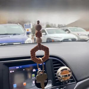 Handmade silicone bead lanyard for car keys and ID badges shown on a rearview mirror