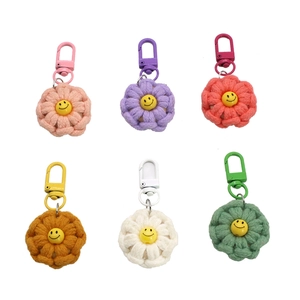 Set of 6 colorful woven flower keychains with smiley face beads and metal lobster clasps