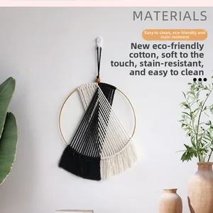 Detail showing eco-friendly cotton rope weaving and golden metal ring on wall decor
