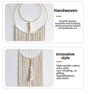 Detail of handcrafted bohemian macrame dreamcatcher with golden ring and cotton tassels
