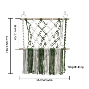 Handwoven boho wall hanging toy hammock with green and white cotton rope and tassels