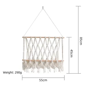 Handwoven Nordic cotton rope hanging basket for books and magazines with wooden support bars