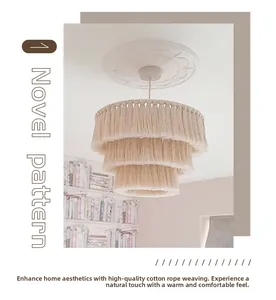 Close-up of three-tier round macrame lampshade with handmade boho cotton fringe details