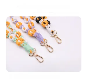 Detail of colorful hand-woven floral keychains with sturdy alloy lobster clasps