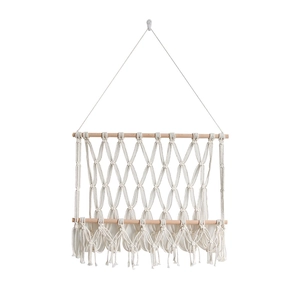 Handmade bohemian cotton rope wall hanging bookshelf with natural wood and tassels