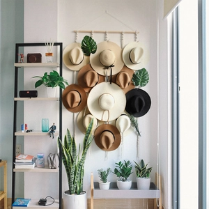Boho woven macrame hat rack wall hanging organizer for display in living room