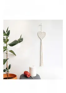 Detail of 3mm cotton cord weaving on this bohemian heart-shaped tassel wall hanging
