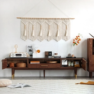 Handwoven boho wall hanging with ivory cotton ropes, geometric patterns and wooden beads