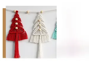 Detailed macro of handwoven macrame Christmas tree wall hanging with wooden beads and tassels