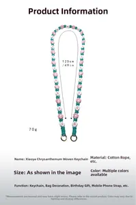 Detailed view of handmade woven daisy lanyard with gold metal ring and 125cm length