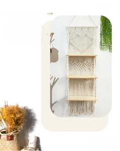 Detailed macro view of the three-tier handmade woven tapestry shelf with heart pattern
