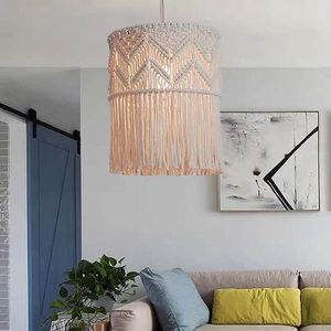 Detail of Boho Macrame lamp shade showing handmade cotton weave and fringed tassels