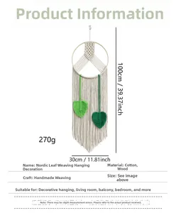 Detail of Nordic leaf woven wall hanging with cotton fringe and wood ring 30x100cm
