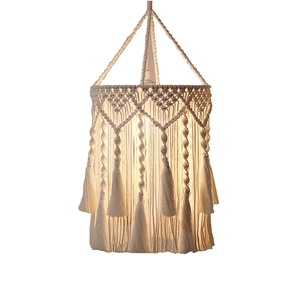 Handmade bohemian cotton rope macrame lampshade with tassel trim and woven diamond patterns