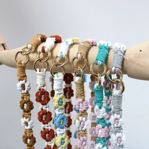 Handmade woven daisy flower lanyard with colorful cotton ropes and golden metal rings