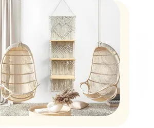 Detail of bohemian handmade woven wall shelf with three tiers of natural wood and cotton rope