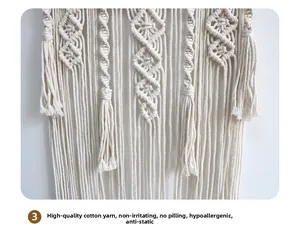 Close-up of bohemian hand-woven cotton tapestry showing intricate knots and tassel texture