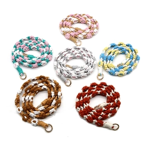 Handmade woven daisy flower straps for mobile phones and bags with golden metal clasps