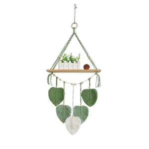Bohemian handmade macrame wall hanging shelf with sage green woven leaves and wood